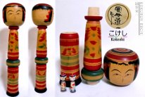 Kokubun Eiichi 3 (国分栄一) 50 in tall Yajiro, Nesting Komochi (子持ち) Kokeshi. Mum Flower Design on parnt and one of the little children. The other has iris.