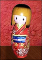 Red Kimono KimeKomi This lovely Kokeshi was fashioned after another Japanese doll craft, KimeKomi. Fabric is tucked and glued into grooves carved into the body form. Thanks to...