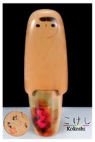 Yokozuka Ikuhō (横塚 郁芳) This Kokeshi was initially Translated to Yokuzaka Kunihiko but I recently found some more Kokeshi by the artist with the same Signature listed as Yokozuka Ikuo