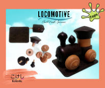 Kokeshi Toys: This toy fits both our (1) Tops and (2) Modes of transportation toy groups.